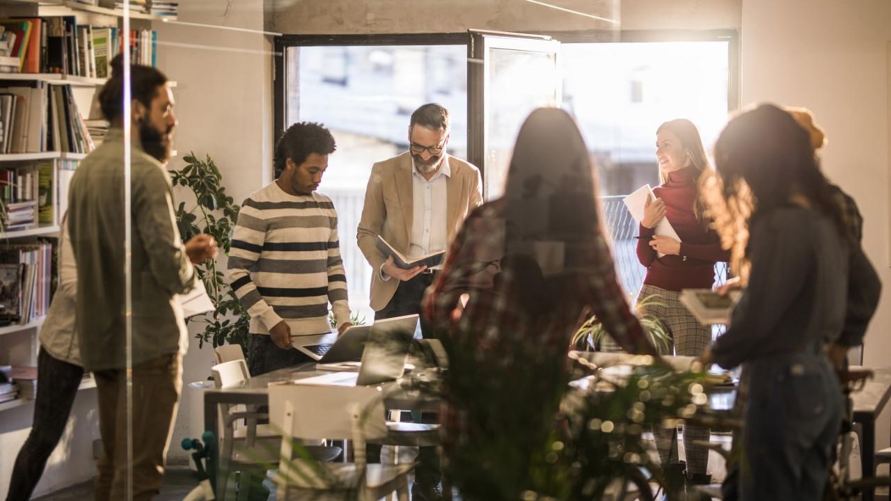 Diverse group of coworkers together in a conference room